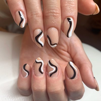 French manicure with floral artwork