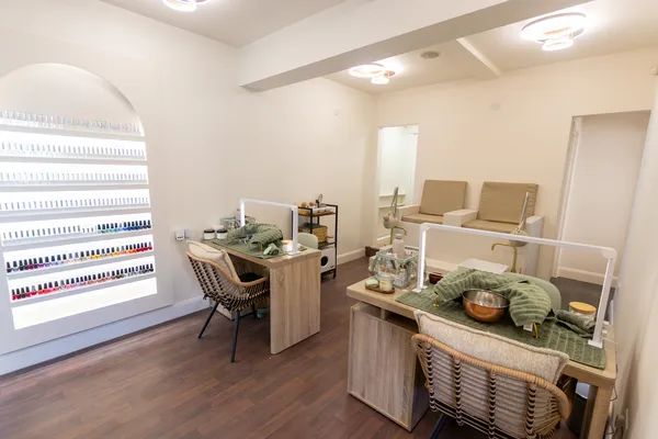 Nail desks and pedicure stations in salon